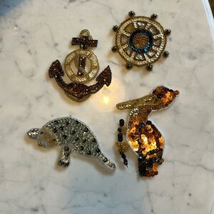Set of 4 nautical themed sequined vintage appliqués.